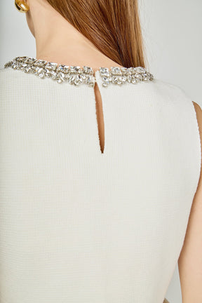 Jewel Trim Neck Peplum Knit Top