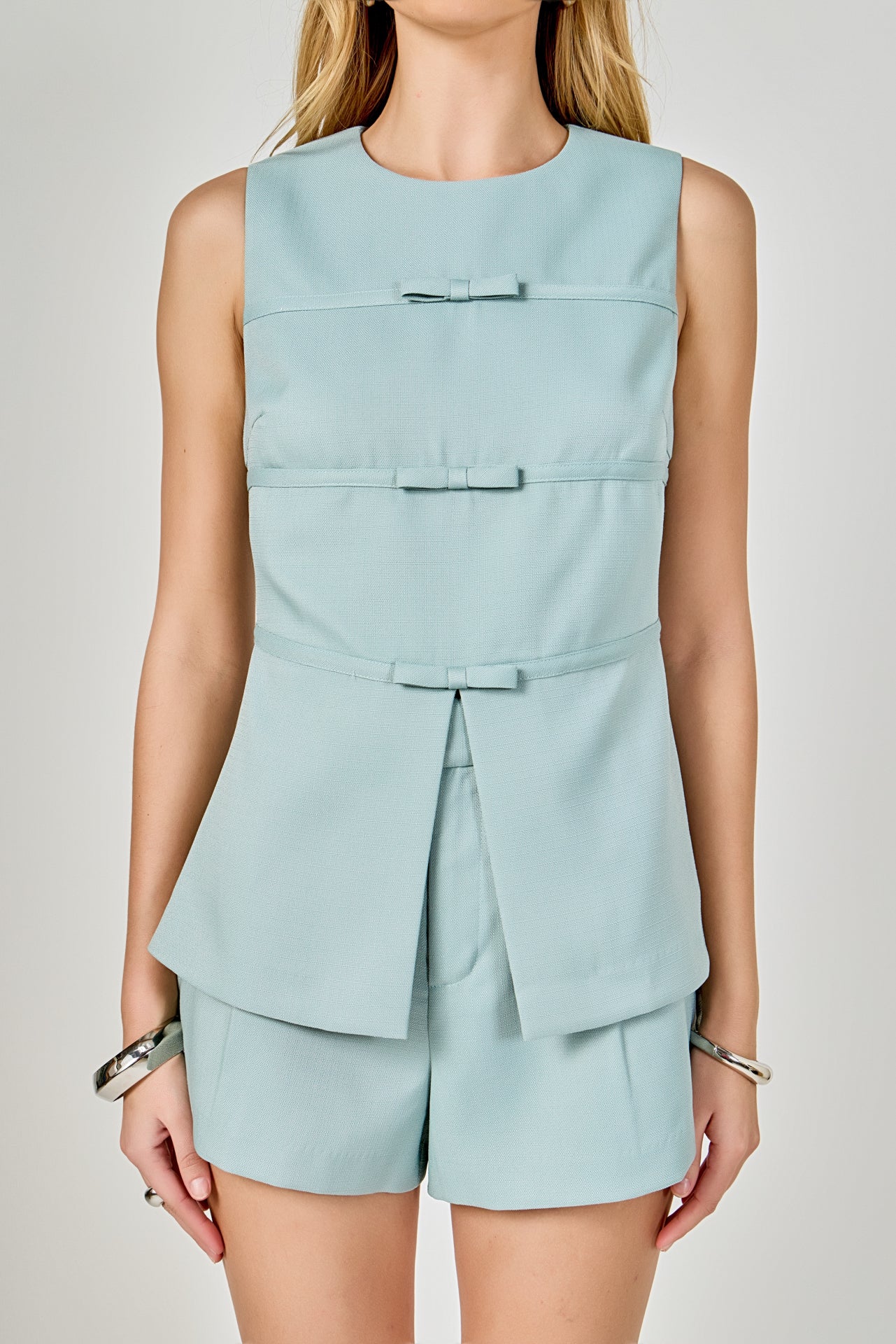 Front Slit Sleeveless Bow Trimmed Top