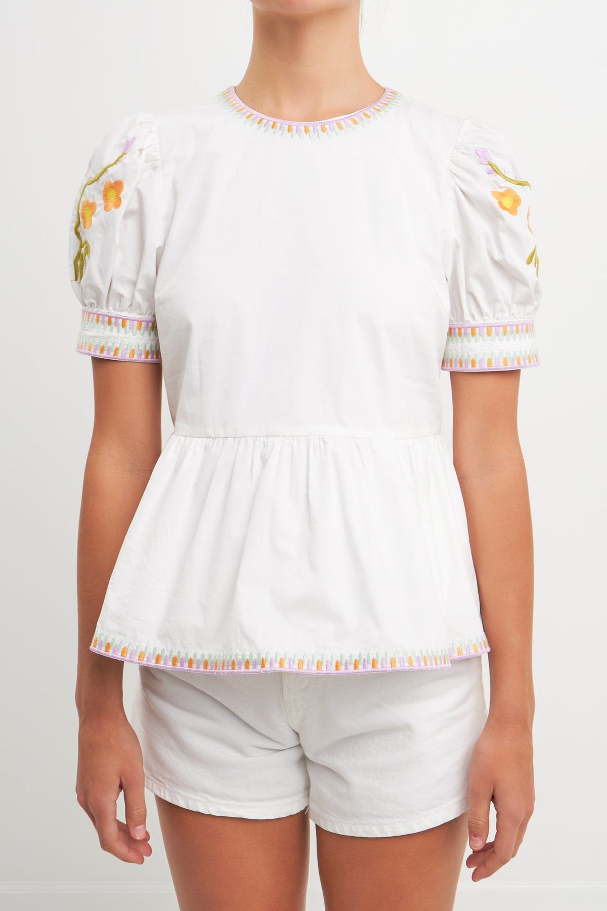 Embroided Peplum Top
