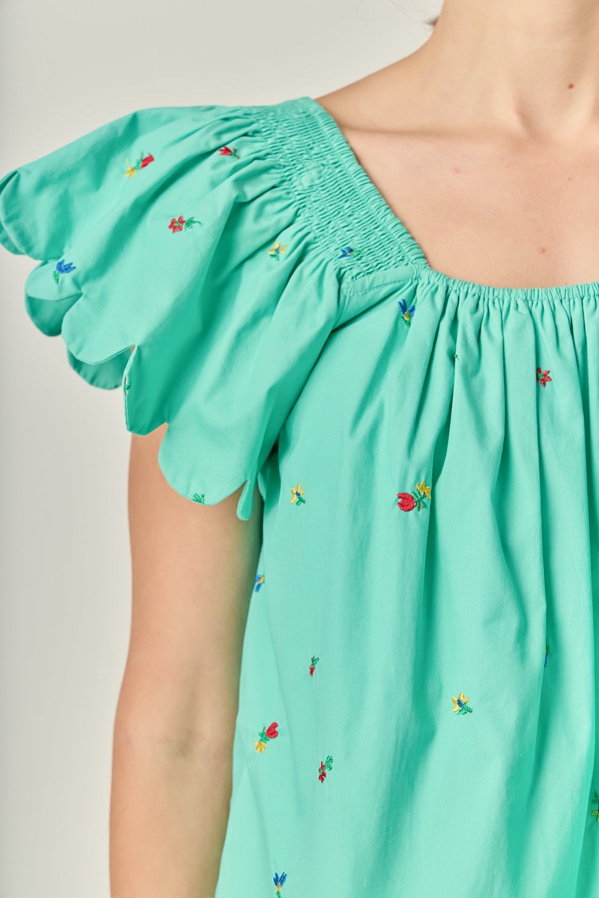 Scalloped Hem Ruffle Detail Top