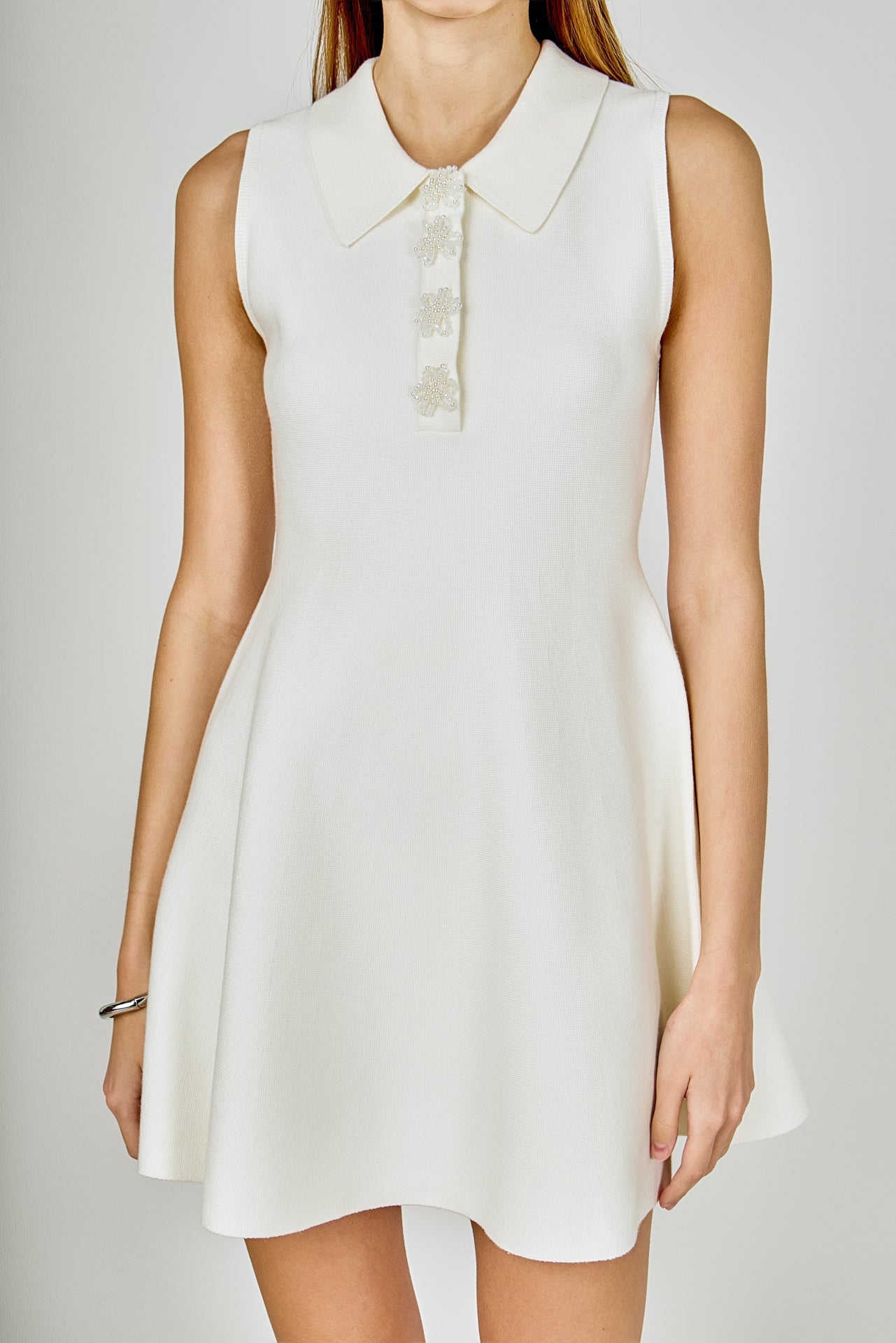 Pearl Bow Sleeveless Flare Knit Dress Pearl Bow Sleeveless Flare Knit Dress